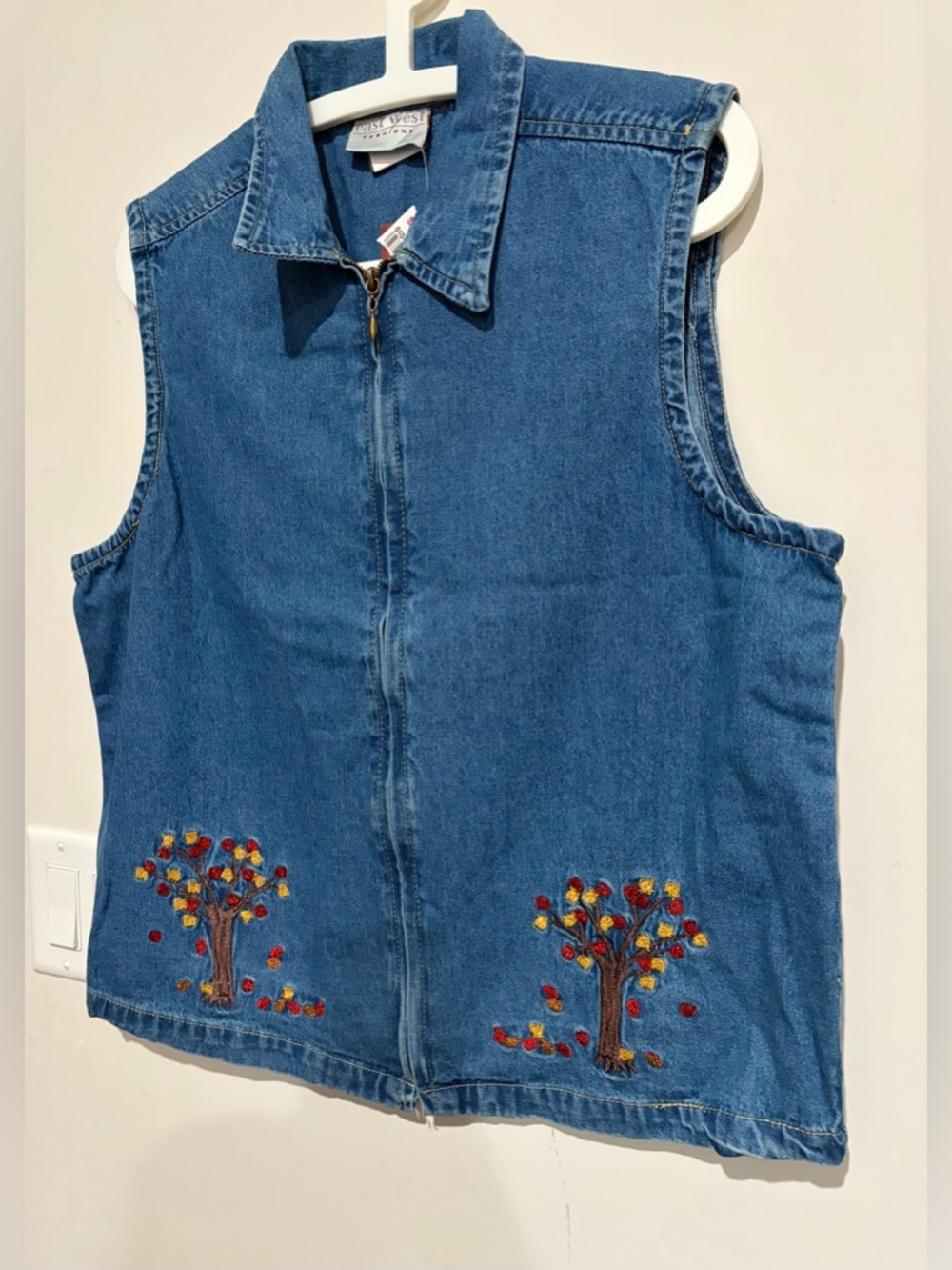 Brand new with tags, cute vintage denim vest with stitching
